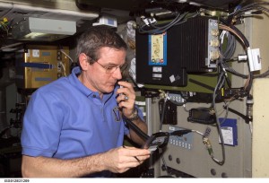 Bill McArthur operating a Kenwood TM-D700a aboard the International Space Station